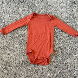 Kyte Baby clementine long sleeve bodysuit
